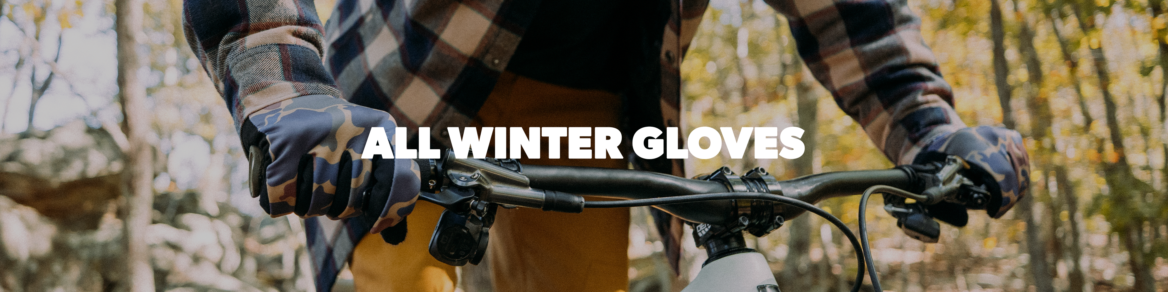 Person wearing winter gloves on a bike with 'All Winter Gloves' text overlay