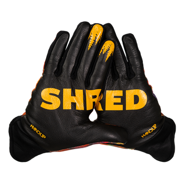 Black gloves with yellow 'SHRED' text on a white background