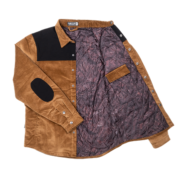 A brown suede and black panel button-up shirt jacket with a patterned purple-brown quilted lining, laid flat on a white background.