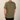 A man viewed from the back wearing an olive green short-sleeve t-shirt and black pants, standing against a plain light beige background.