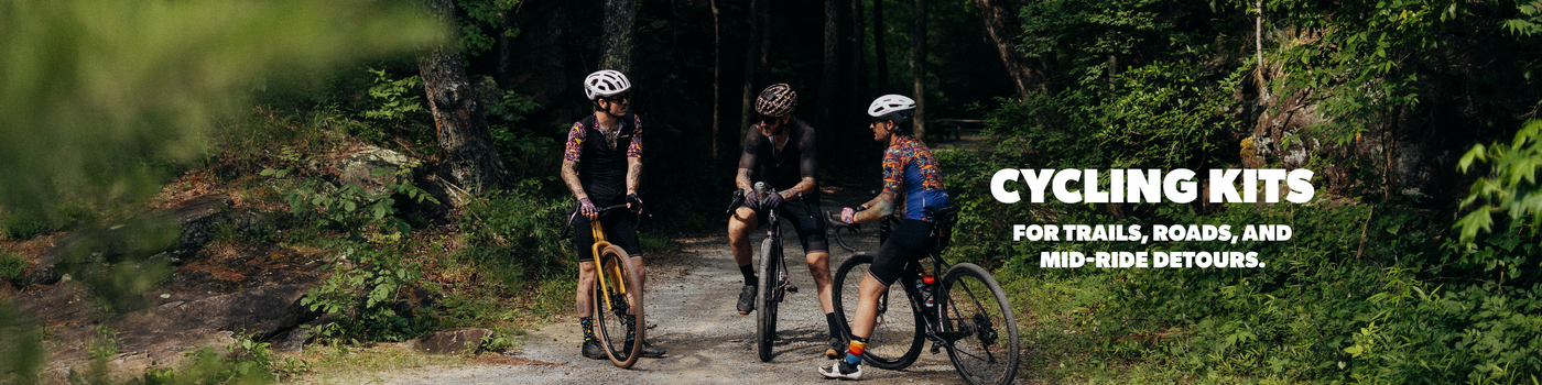 Three cyclists on a trail with text about cycling kits.