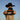 Person wearing a cowboy hat and gloves with 'Giddy Up' text against a clear blue sky.