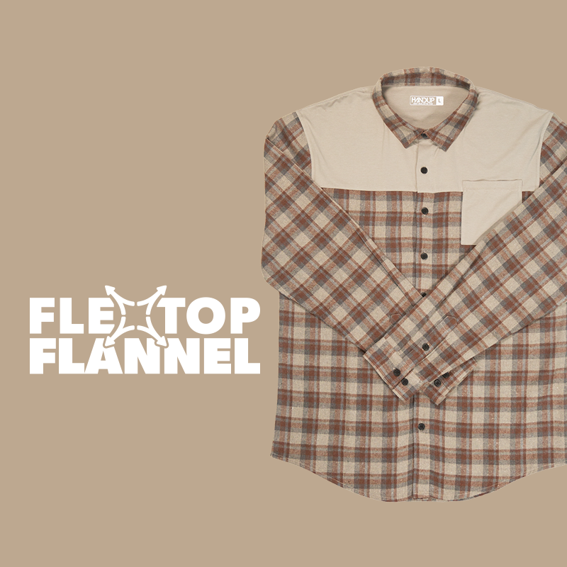 Plaid flannel shirt with 'Flextop Flannel' branding on a beige background