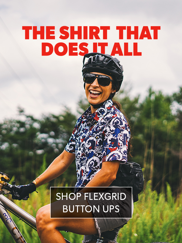 Person on a bike wearing a colorful shirt with text promoting Flexgrid button ups.