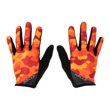 Pair of gloves with orange and black camouflage pattern on a white background