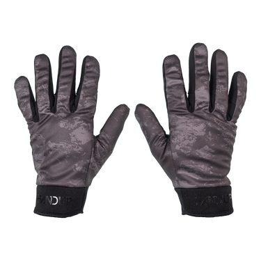 A pair of winter gloves shown flat against a white background, featuring a dark gray and black digital camouflage pattern on the back of the hands and black palms.
