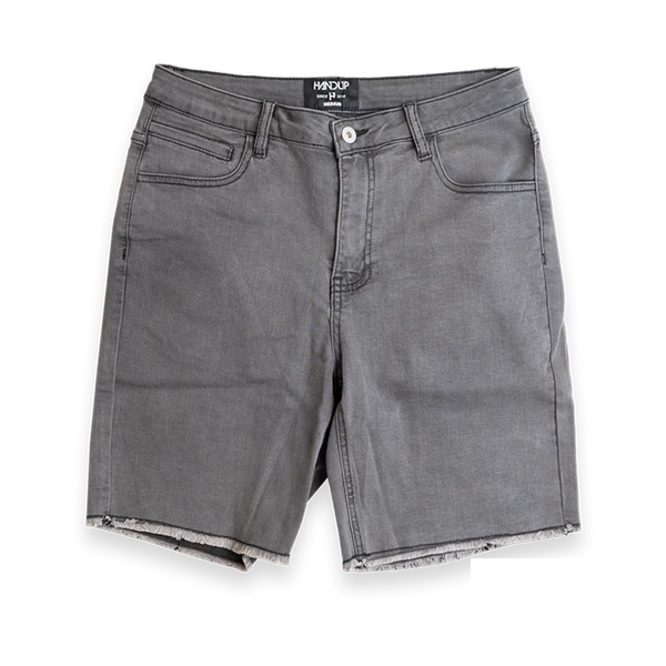 A pair of faded grey jorts, shorts that are designed to look like overalls but without the top buttons and straps.