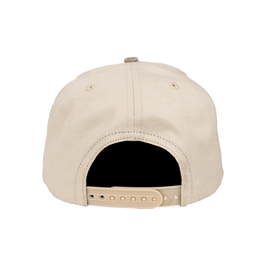 Beige baseball cap on a white background