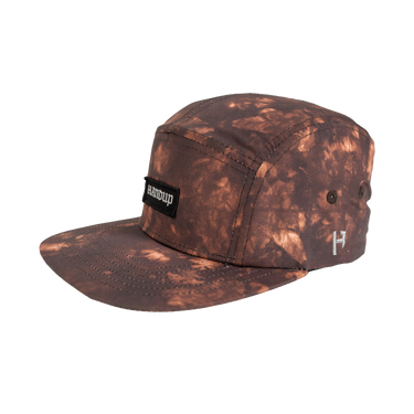 Brown camouflage cap with a brand logo on a white background