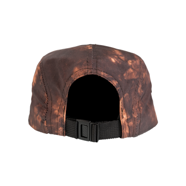 Brown camouflage cap with a black buckle on a white background