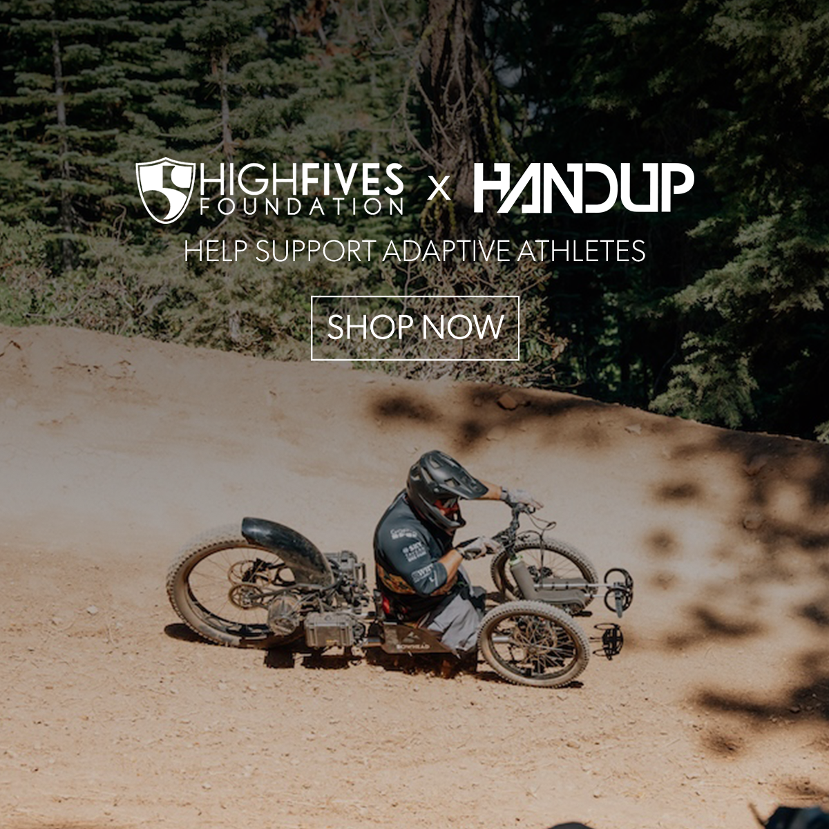 Person on a custom bike in a natural setting with 'High Fives Foundation' and 'Handup' branding.