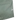 Close-up of green shorts with a brand logo on a white background