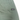 Green shorts with a visible brand label on a white background