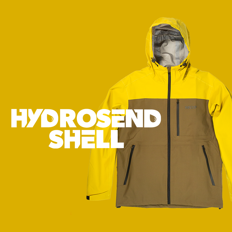 Yellow and brown raincoat with 'Hydrosend Shell' text on a yellow background