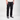 A person wearing black acid-wash straight-leg jeans, a cream t-shirt, and black canvas sneakers with white laces, standing against a light gray studio background.
