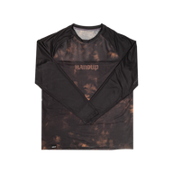 long sleeve mountain bike jersey with a black and tan tie dye design and 'HANDUP' logo