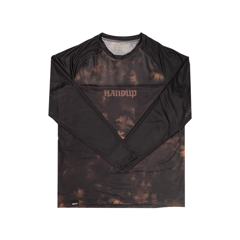 long sleeve mountain bike jersey with a black and tan tie dye design and 'HANDUP' logo