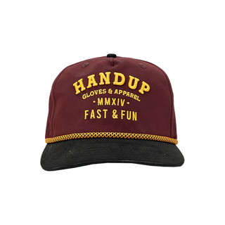 Maroon and black cap with yellow text on a white background