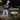 Person wearing cycling gear with a bicycle, standing in a tunnel, promoting Marin x Handup collection.