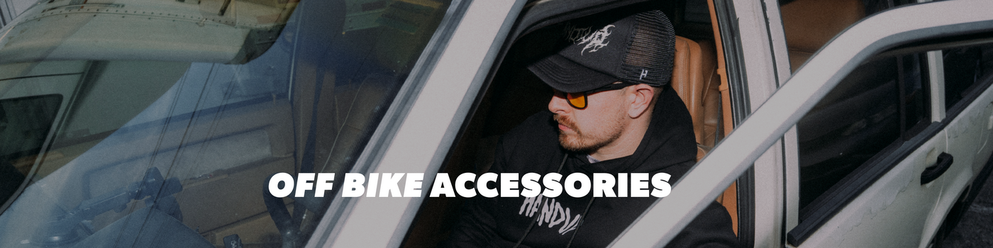 Man sitting in a car with 'Off Bike Accessories' text overlay
