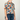 Floral patterned shirt on a white background