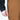 Close up showing someone unzipping a side pocket of brown pants