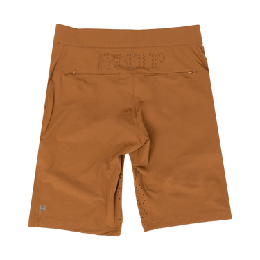 Brown mountain biking shorts featuring two back pockets and inseam vents