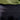 close up of the back of a man wearing mountain bike shorts, featuring the word HANDUP at the top of the shorts