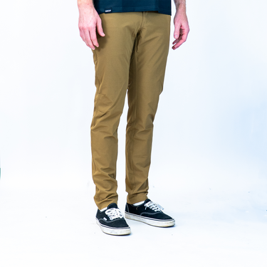 Person wearing tan tech pants 