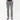 person wearing grey jeans and black sneakers on a white background
