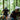 Two mountain bikers on a trail through a forest