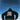 Person wearing a black hoodie with a graphic design against a blue sky