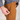 Person wearing brown pants with a blurred background