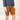 a woman wearing brown shorts and a blue long-sleeve shirt on a white background