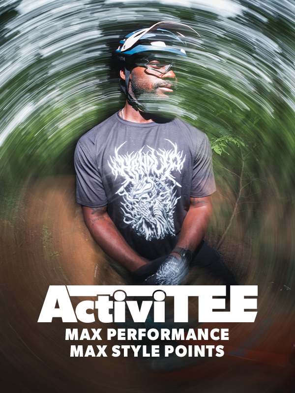 Person wearing a helmet and gray t-shirt with white design, surrounded by swirling green and brown colors, with 'Activitee' branding.