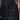 Black apron with a pocket on a person wearing a colorful shirt.