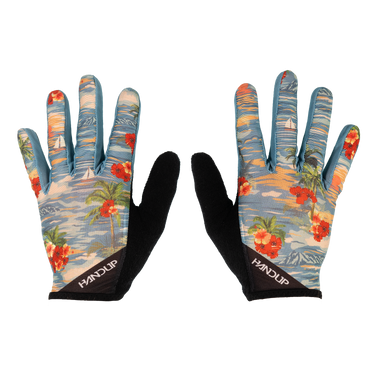 Pair of gloves with tropical design and black palm trees on a white background