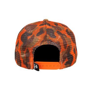 Camouflage-patterned cap with orange and brown design on a white background