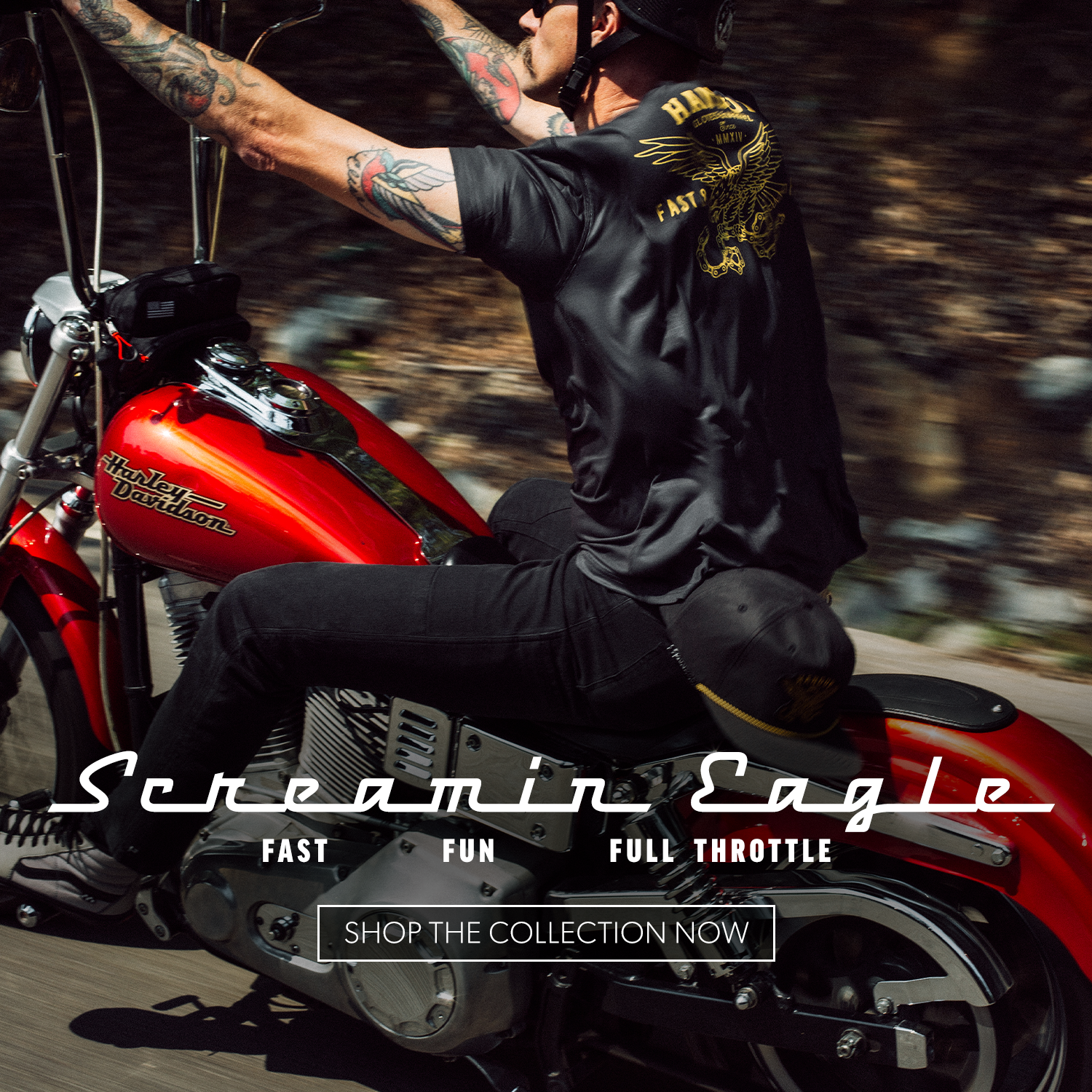 Person riding a red motorcycle with 'Screamin' Eagle' branding, wearing a black jacket with eagle design.