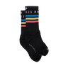 Black socks with colorful stripes on a white background