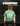 Person wearing a green t-shirt with a graphic design and text, standing against a dark background.